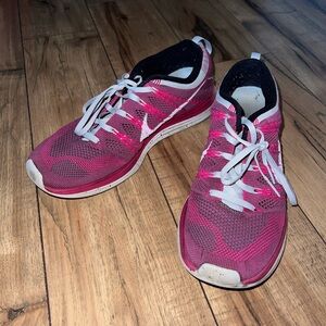 pink nike tennis shoes